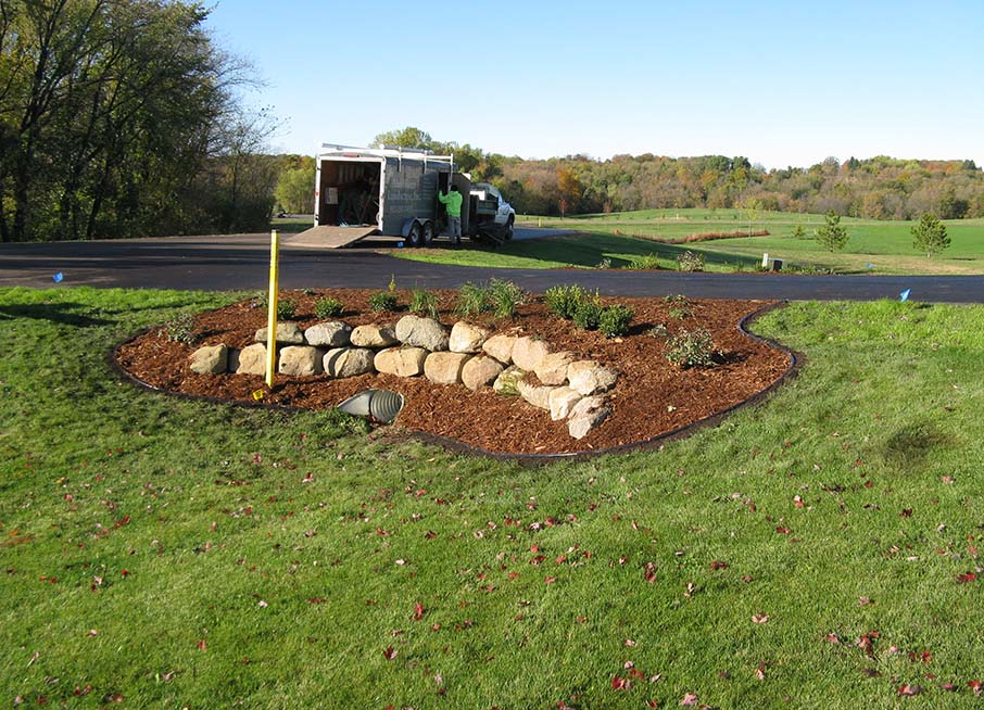 drainage correction installation of a retaining wall and culvert underneath a driveway