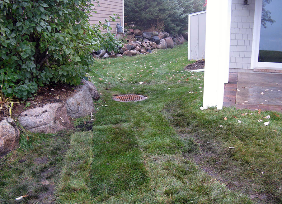 drainage correction install in a backyard
